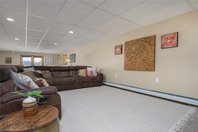 310 Highpark Dr, Anaconda, MT 59711 - carpeted living room with a baseboard radiator, recessed lighting, a drop ceiling, and baseboards