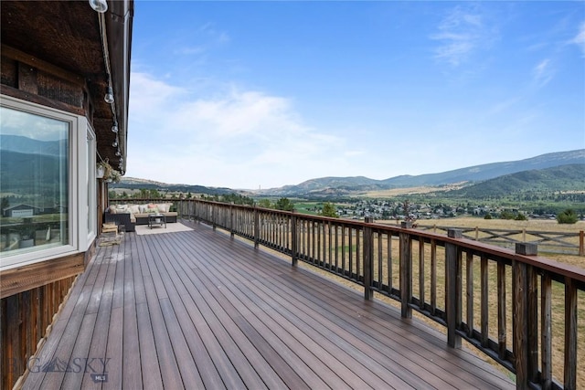 310 Highpark Dr, Anaconda, MT 59711 - wooden terrace with outdoor lounge area and a mountain view