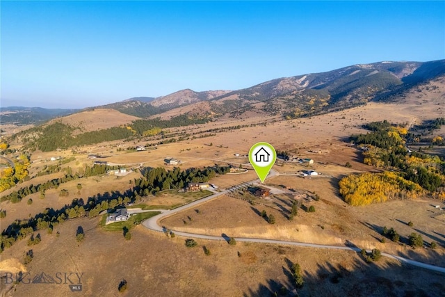 310 Highpark Dr, Anaconda, MT 59711 - aerial view of property and surrounding area with a mountain backdrop and rural landscape