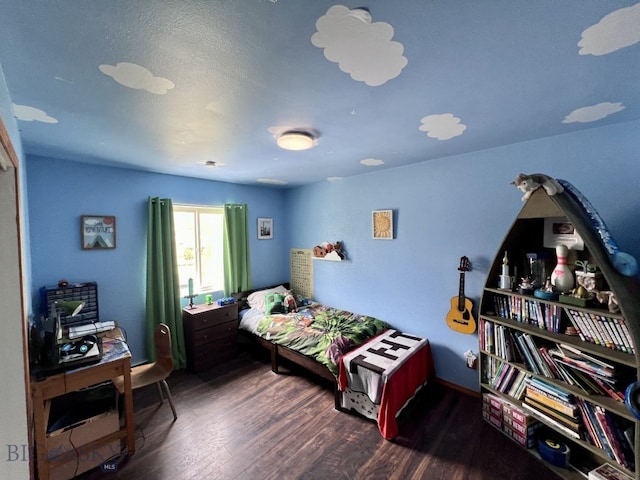 bedroom featuring dark hardwood / wood-style floors