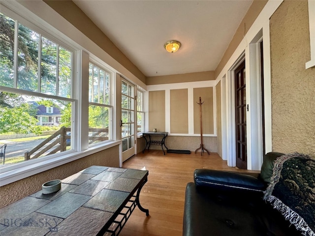 sunroom featuring plenty of natural light