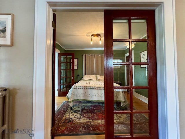 bedroom with crown molding