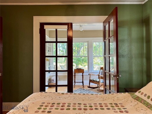 bedroom featuring crown molding