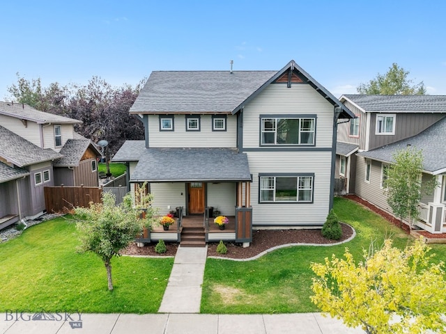 view of front of property featuring a front lawn