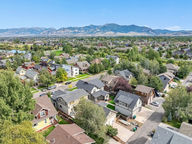 drone / aerial view featuring a mountain view