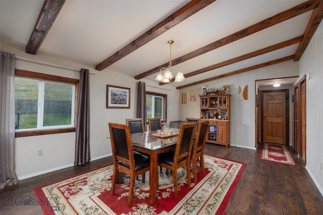 dining room featuring lofted ceiling with beams, dark wood-type flooring, and an inviting chandelier