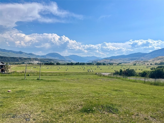 property view of mountains featuring a rural view