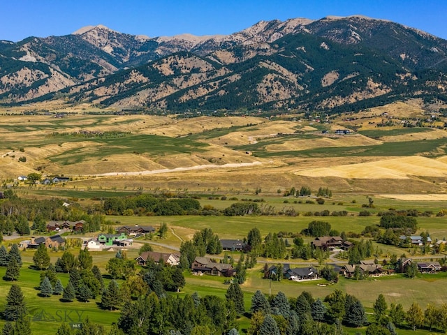 view of mountain feature with a rural view