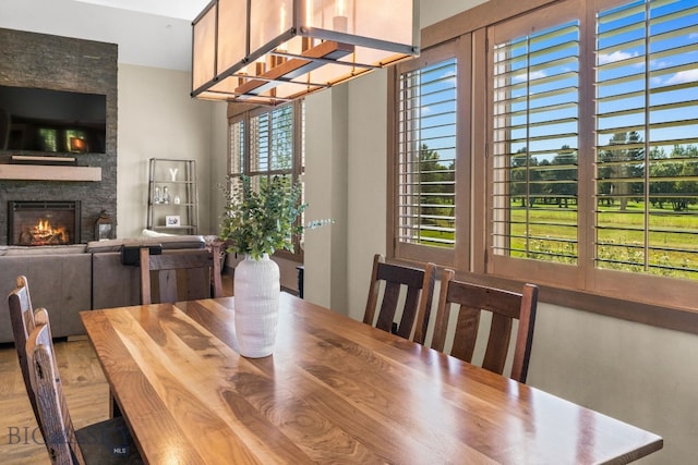 dining space with a fireplace