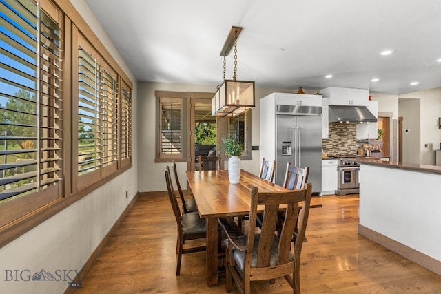 dining room featuring light hardwood / wood-style floors