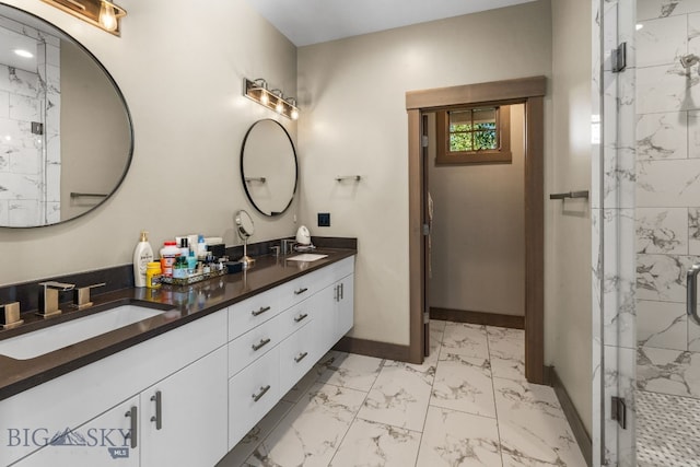 bathroom featuring vanity and a shower with door