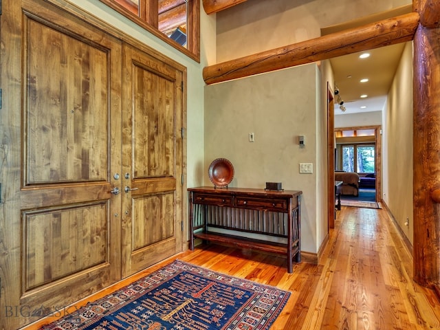 hall with light wood-type flooring