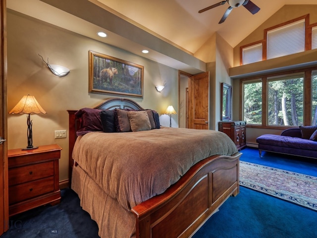 carpeted bedroom featuring ceiling fan, lofted ceiling, and a baseboard heating unit