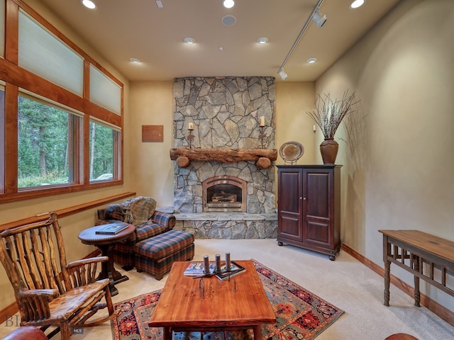 carpeted living room with a fireplace