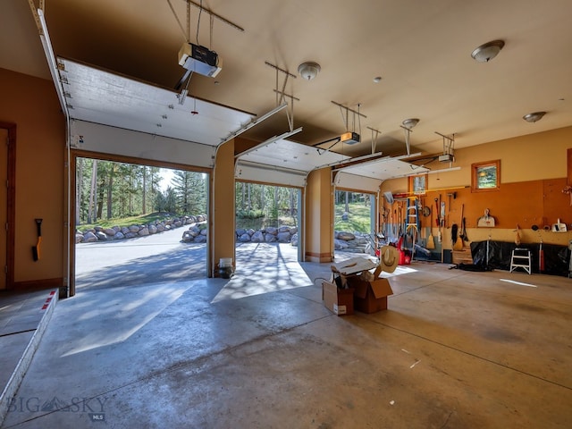 garage featuring a garage door opener