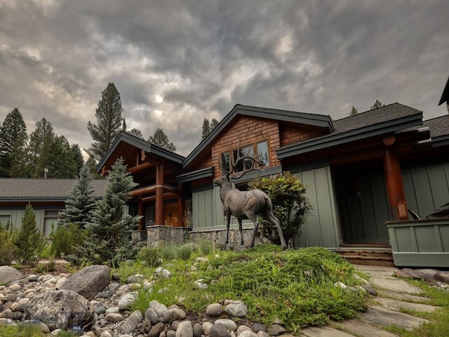 3686 Pinewood Dr, Big Sky, MT 59716 - rear view of property featuring board and batten siding