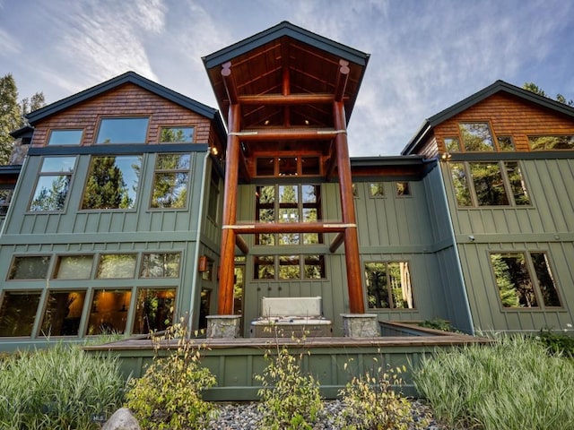 3686 Pinewood Dr, Big Sky, MT 59716 - back of house with board and batten siding