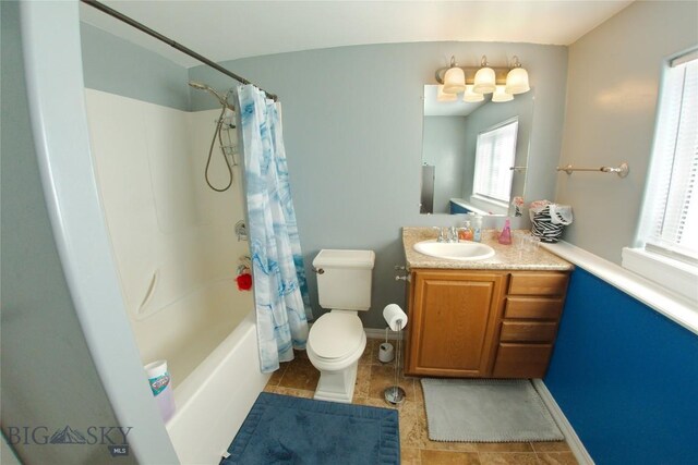 full bathroom with shower / tub combo with curtain, vanity, and toilet