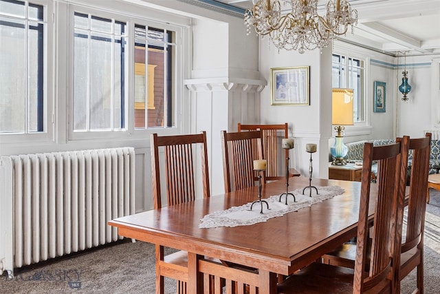 dining room with beamed ceiling, radiator, dark carpet, and a chandelier