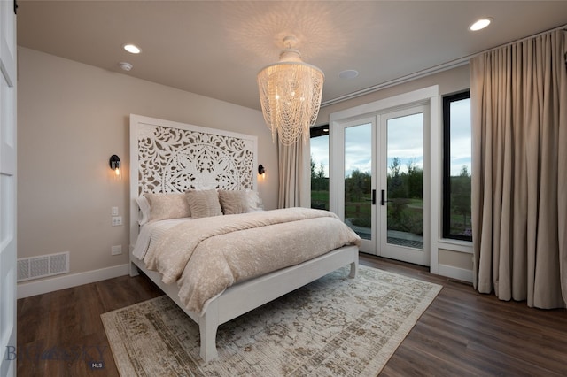 bedroom with access to outside, dark wood-type flooring, and french doors