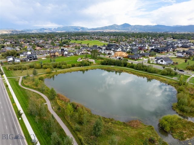 aerial view with a water and mountain view