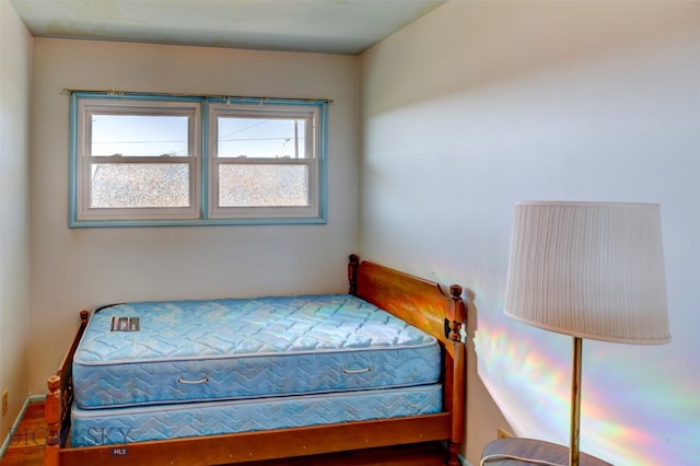 bedroom featuring multiple windows