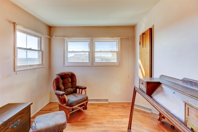1112 Pritchard NW, Harlowton, MT 59036 - living area featuring light wood-style floors and baseboards