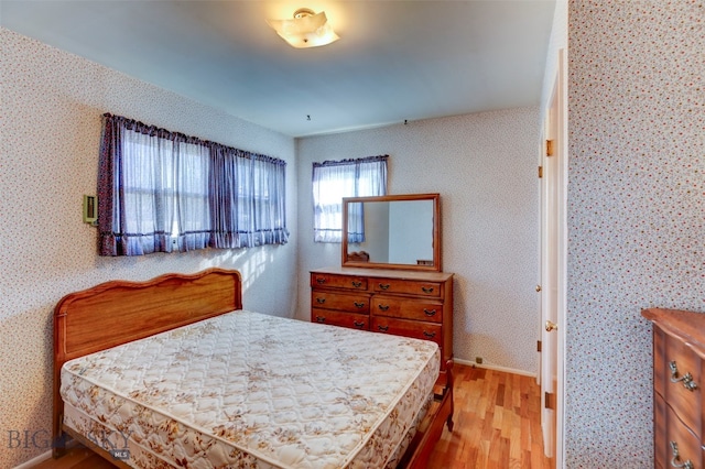 bedroom featuring light hardwood / wood-style floors