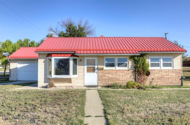 1112 Pritchard NW, Harlowton, MT 59036 - view of front facade featuring a front lawn, stone siding, and metal roof