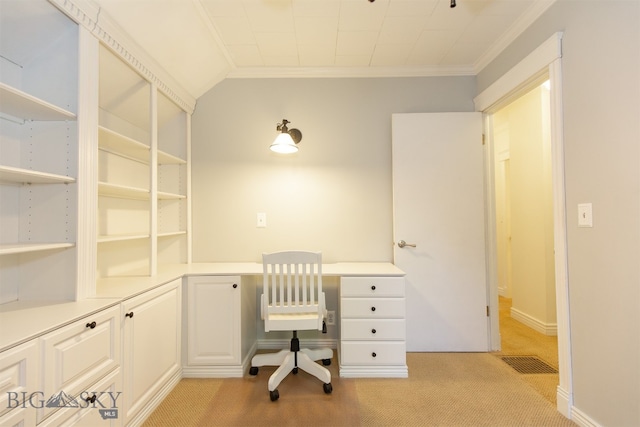 carpeted office featuring ornamental molding and vaulted ceiling