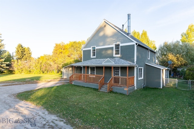 farmhouse featuring a porch and a front lawn