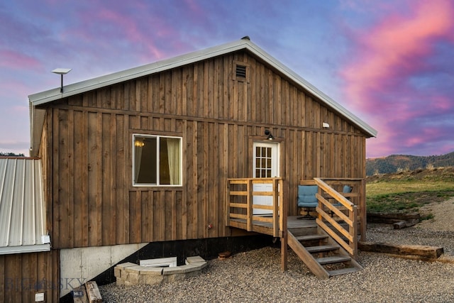 view of property exterior at dusk