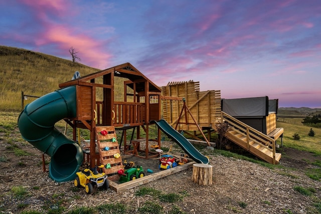 view of playground at dusk