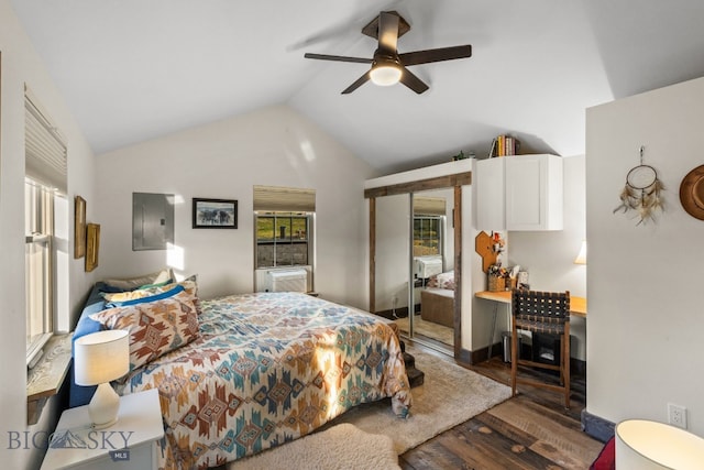 bedroom with ceiling fan, electric panel, high vaulted ceiling, a closet, and hardwood / wood-style floors