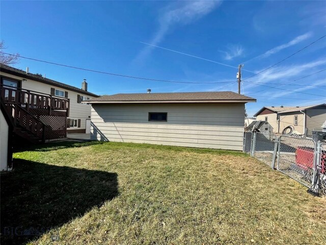1115 E Center St, Dillon, MT 59725 - rear view of property featuring a wooden deck