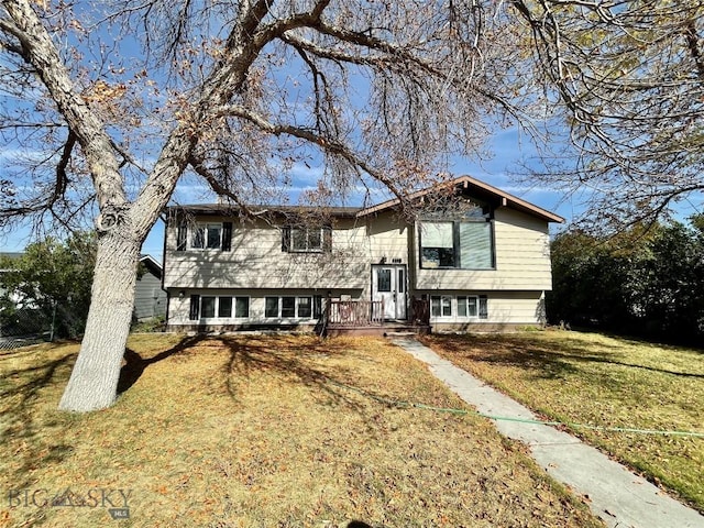 1115 E Center St, Dillon, MT 59725 - raised ranch featuring a front yard
