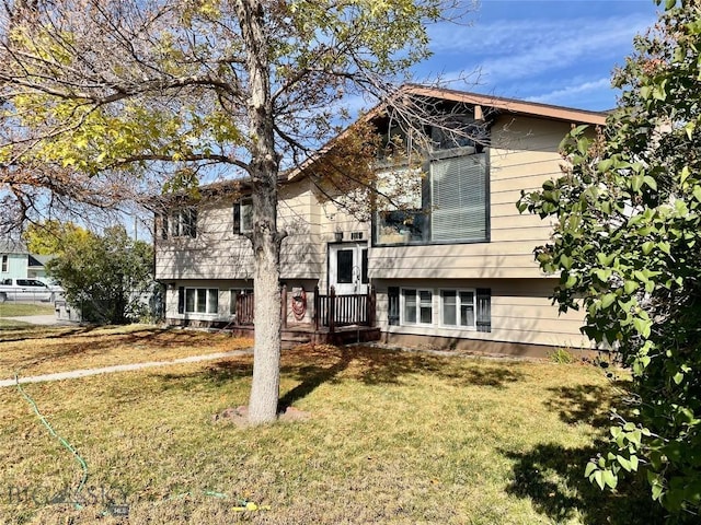 1115 E Center St, Dillon, MT 59725 - split foyer home with a front yard