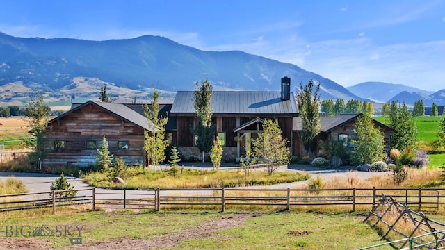 exterior space featuring a mountain view and a rural view