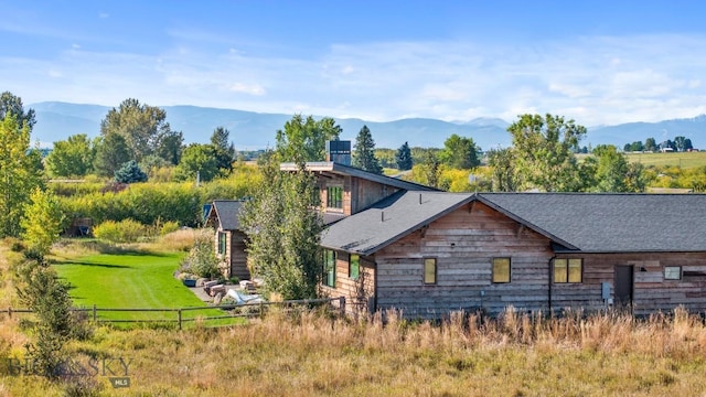 500 Stubbs Ln, Bozeman, MT 59718 - view of property exterior featuring a mountain view and roof with shingles