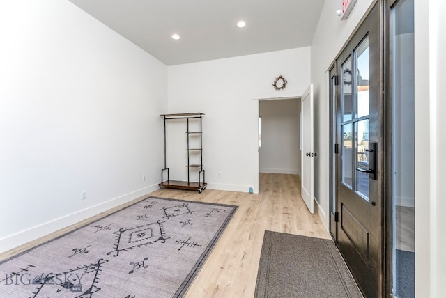 spare room featuring light wood-type flooring