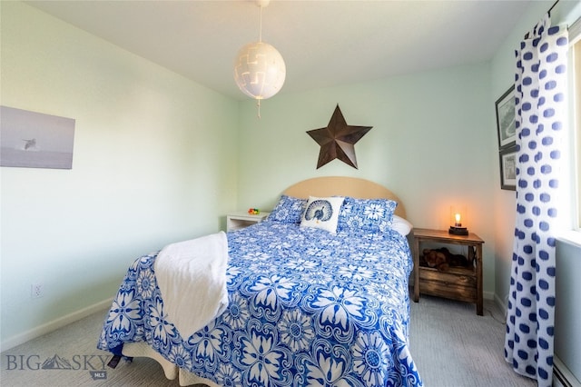 bedroom with light colored carpet