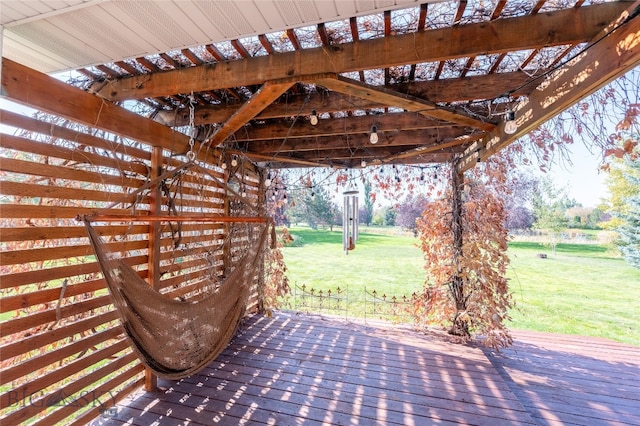 view of patio / terrace featuring a wooden deck and a pergola