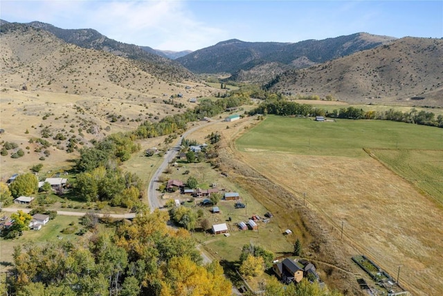 drone / aerial view with a rural view and a mountain view