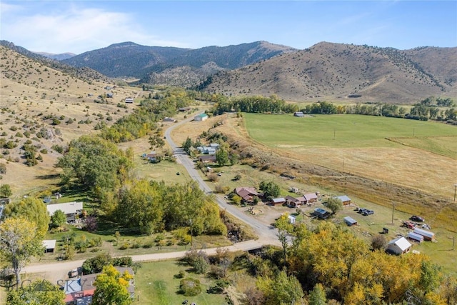 aerial view featuring a rural view and a mountain view