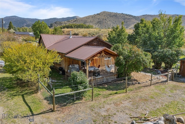 birds eye view of property featuring a mountain view