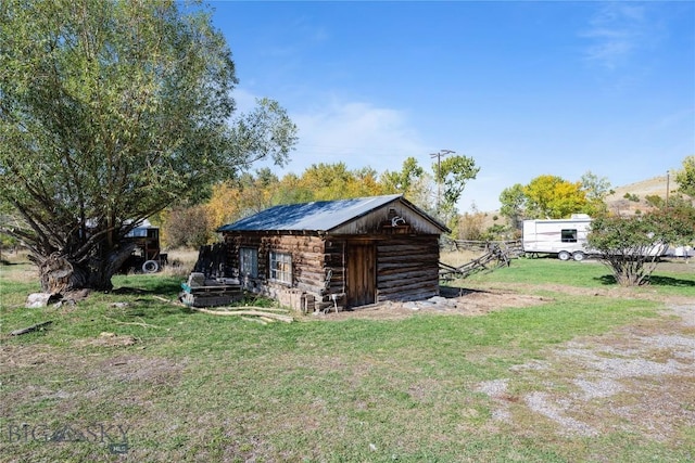 view of outbuilding with an outdoor structure