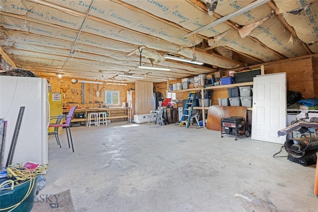 garage featuring freestanding refrigerator