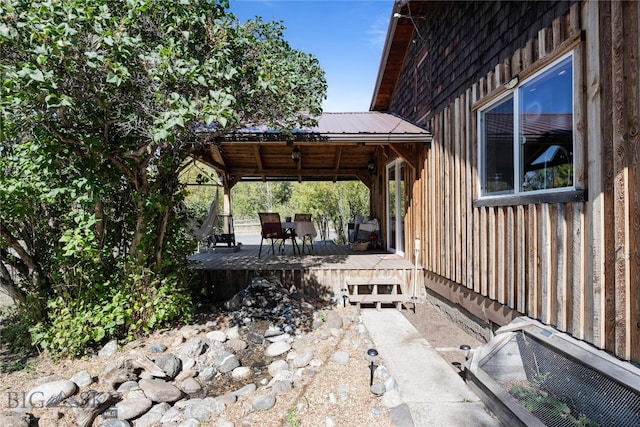 view of patio featuring a gazebo and a wooden deck