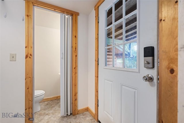 interior space featuring baseboards