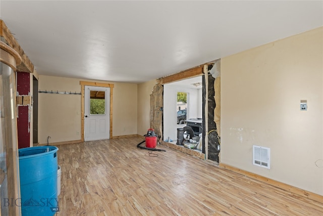 miscellaneous room with wood-type flooring